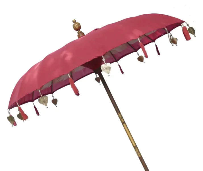 Product image of the product “Bali umbrella, Red with wooden coins and gold leaves hanging around the edge. Approx. 190cm dia. and 250cm height ”